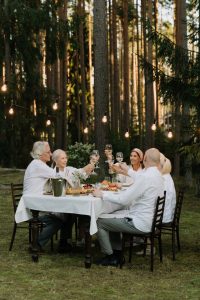 long-term care, image of a group of seniors toasting at a table
