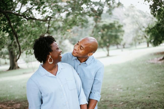 estate planning become necessary, image of middle-aged couple in a park